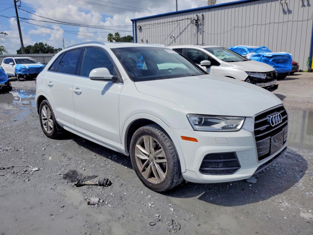 WA1EFCFS8GR012959 · 2016 AUDI Q3 · 4/13