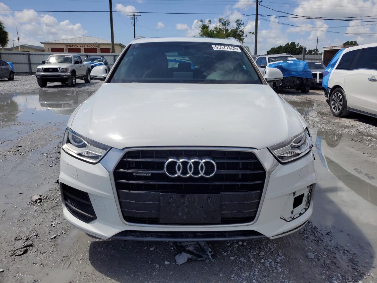 WA1EFCFS8GR012959 · 2016 AUDI Q3 · 5/13
