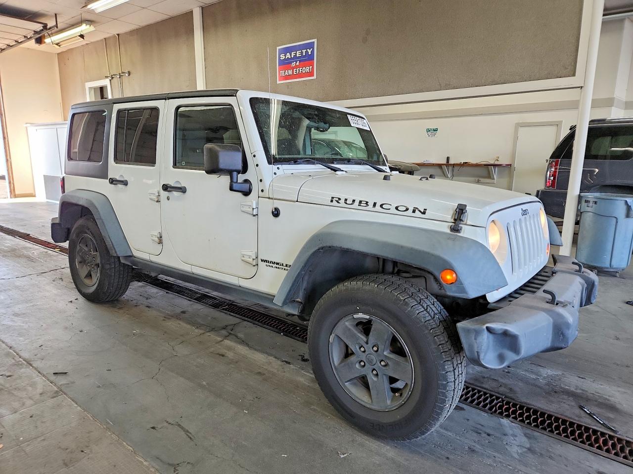 1J4HA6H18BL611468 · 2011 JEEP WRANGLER UNLIMITED · 4/12
