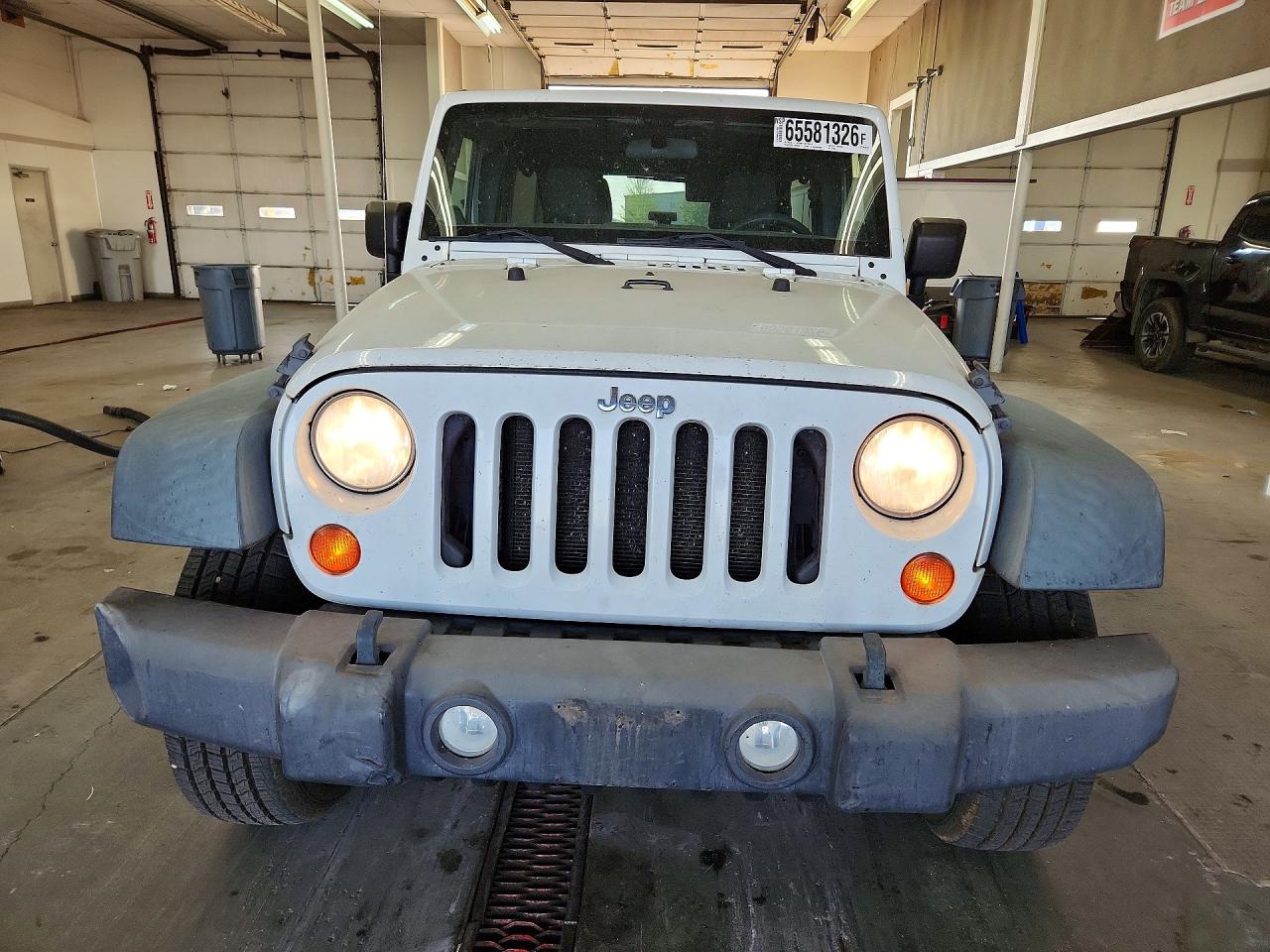 1J4HA6H18BL611468 · 2011 JEEP WRANGLER UNLIMITED · 5/12