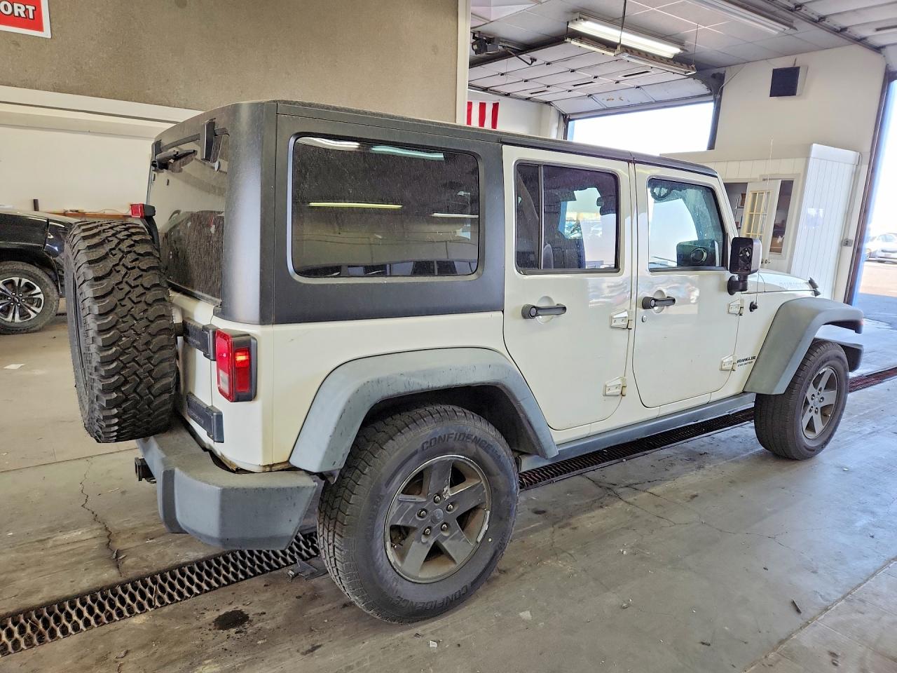 1J4HA6H18BL611468 · 2011 JEEP WRANGLER UNLIMITED · 3/12