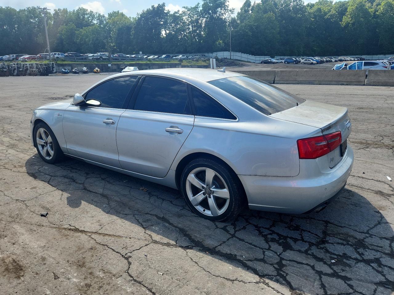 WAUGGAFC7CN061870 · 2012 AUDI A6 · 2/13