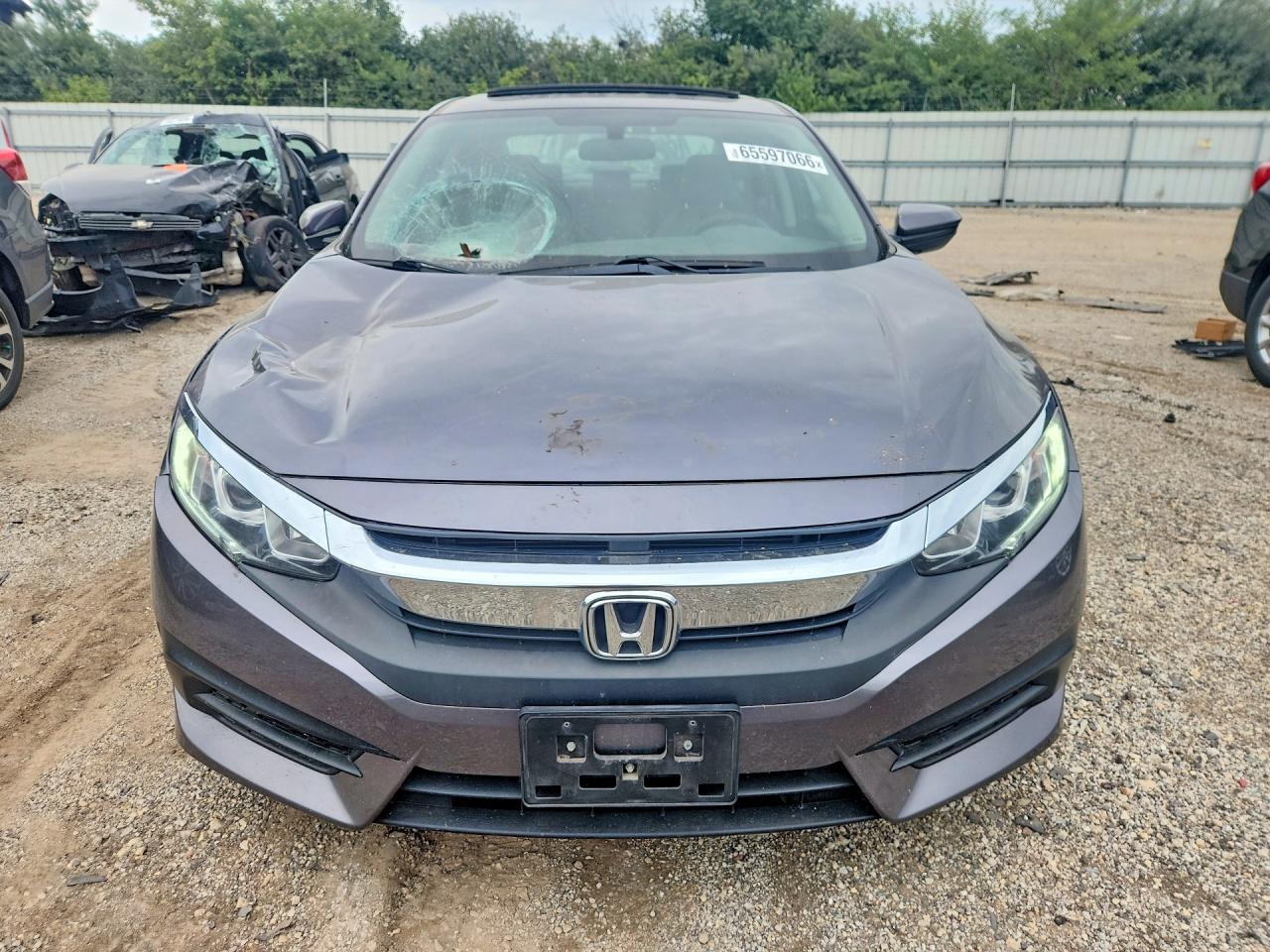 19XFC2F75JE037572 · 2018 HONDA CIVIC · 5/12