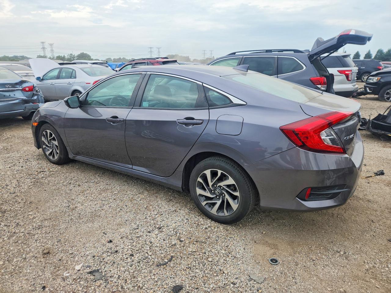 19XFC2F75JE037572 · 2018 HONDA CIVIC · 2/12