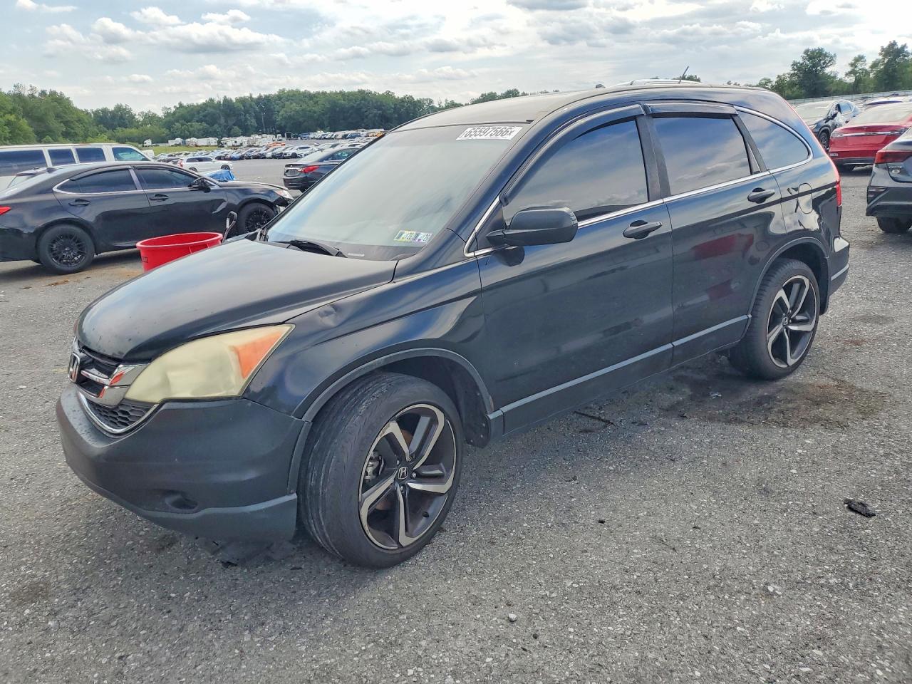 5J6RE4H40BL053106 · 2011 HONDA CR-V