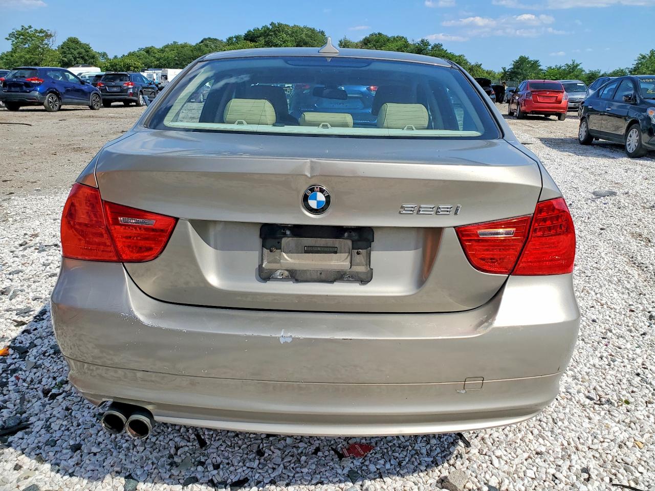 WBAPK535X9A511569 · 2009 BMW 328 · 6/12