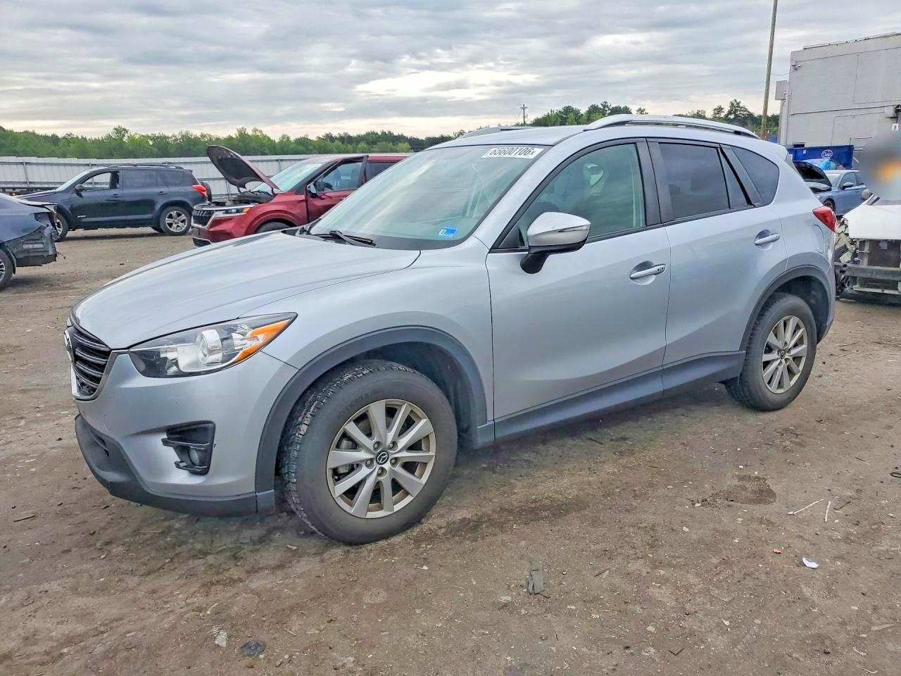 JM3KE2CY7G0893888 · 2016 MAZDA CX-5
