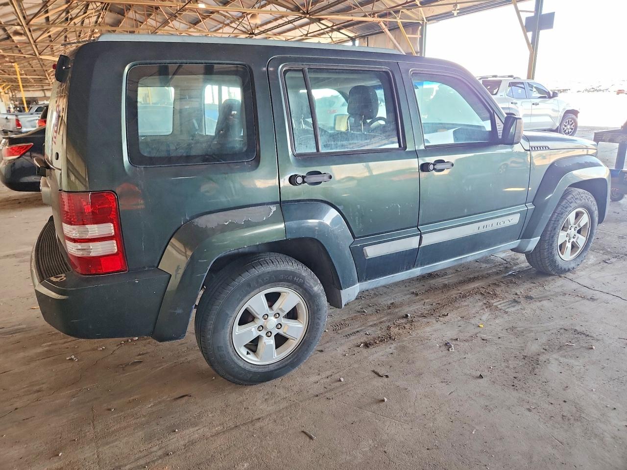 1J4PP2GK9BW594630 · 2011 JEEP LIBERTY · 3/12