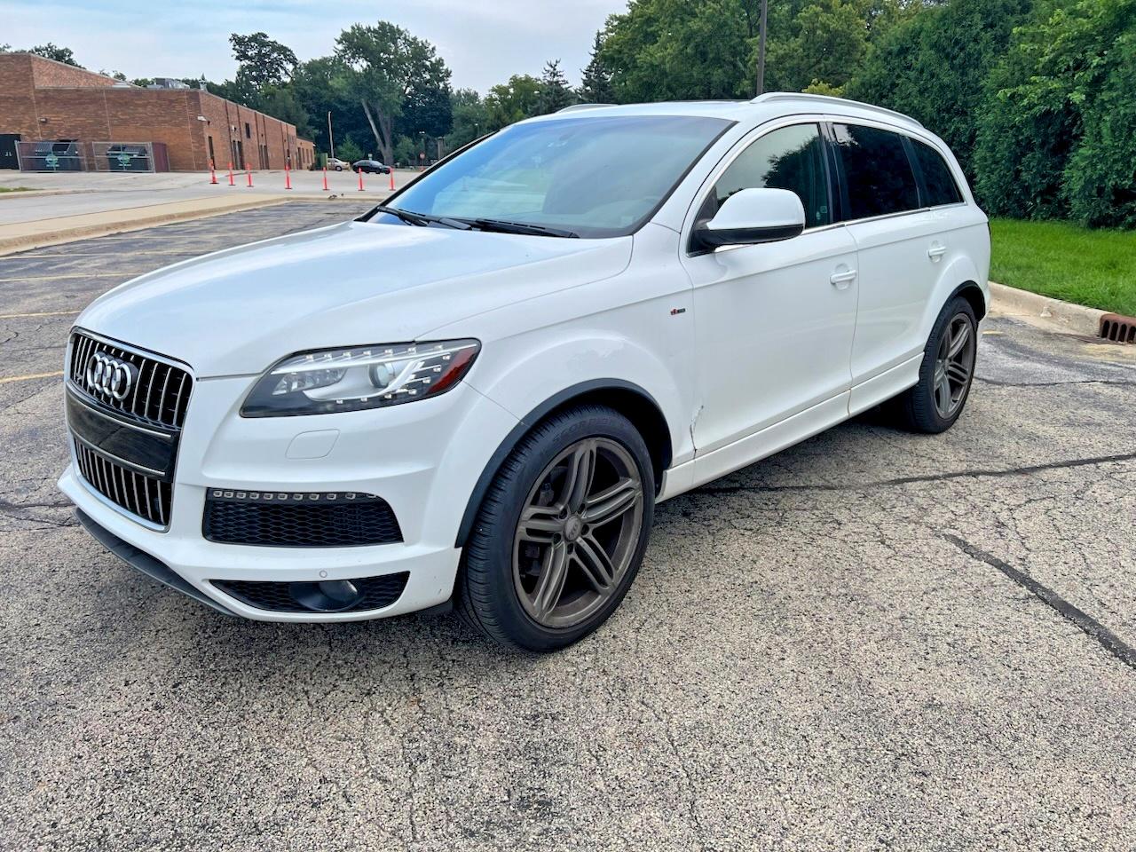 WA1WMAFE6BD004423 · 2011 AUDI Q7 · 2/10