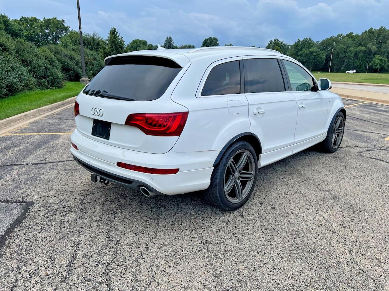 WA1WMAFE6BD004423 · 2011 AUDI Q7 · 4/10