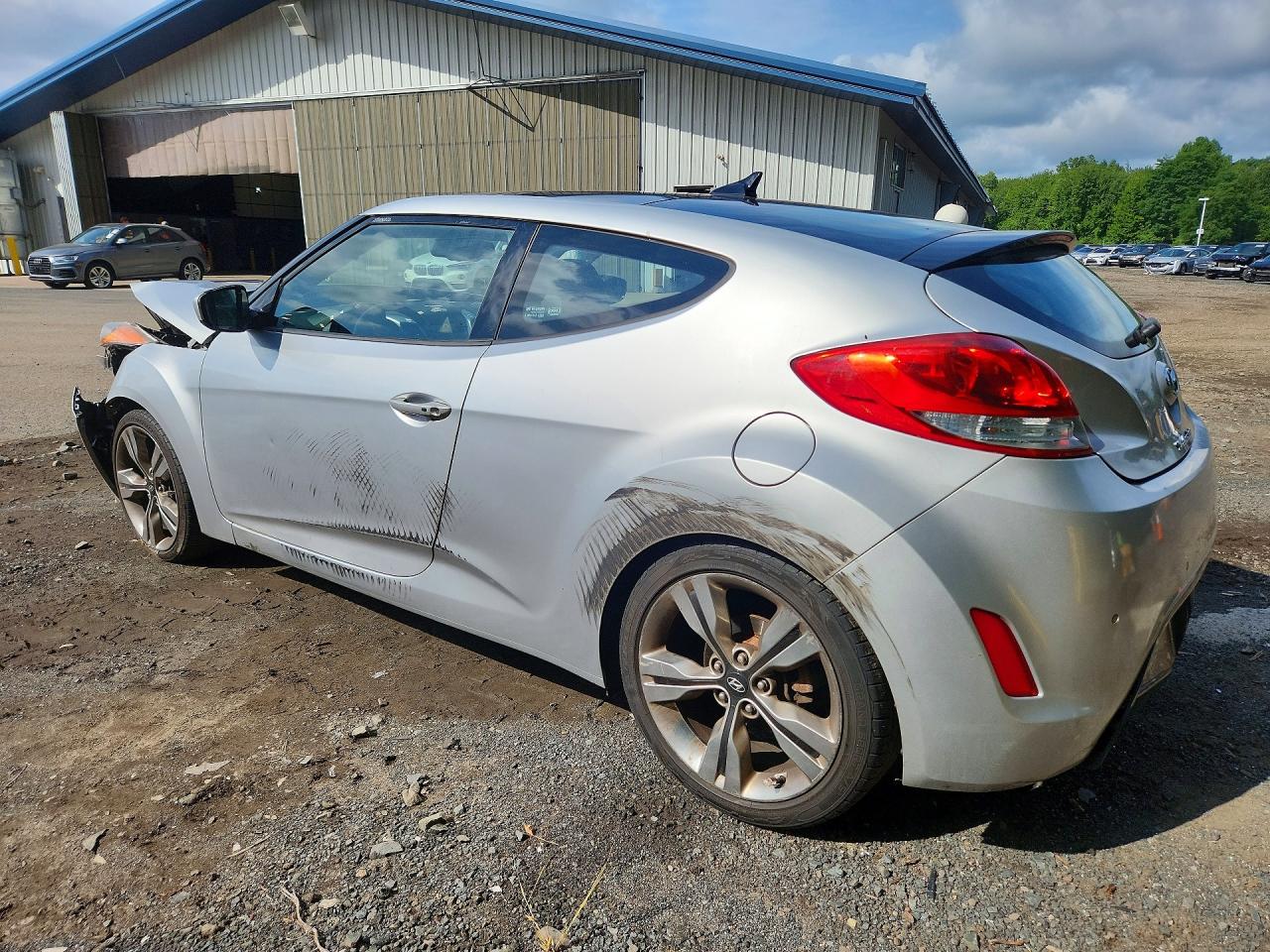 KMHTC6AD5CU059384 · 2012 HYUNDAI VELOSTER · 2/12