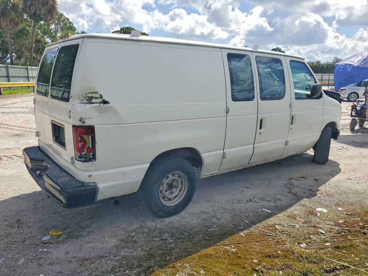 1FTRE14251HB75955 · 2001 FORD E150 · 3/14