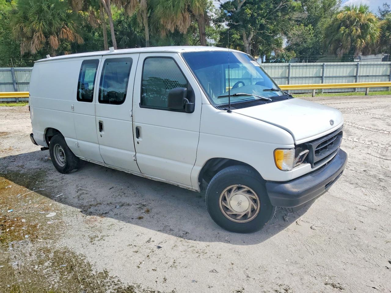 1FTRE14251HB75955 · 2001 FORD E150 · 4/14