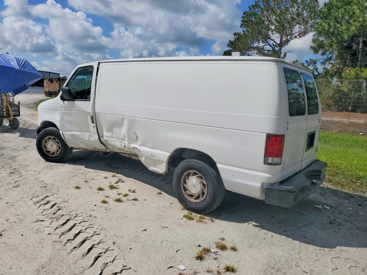 1FTRE14251HB75955 · 2001 FORD E150 · 2/14