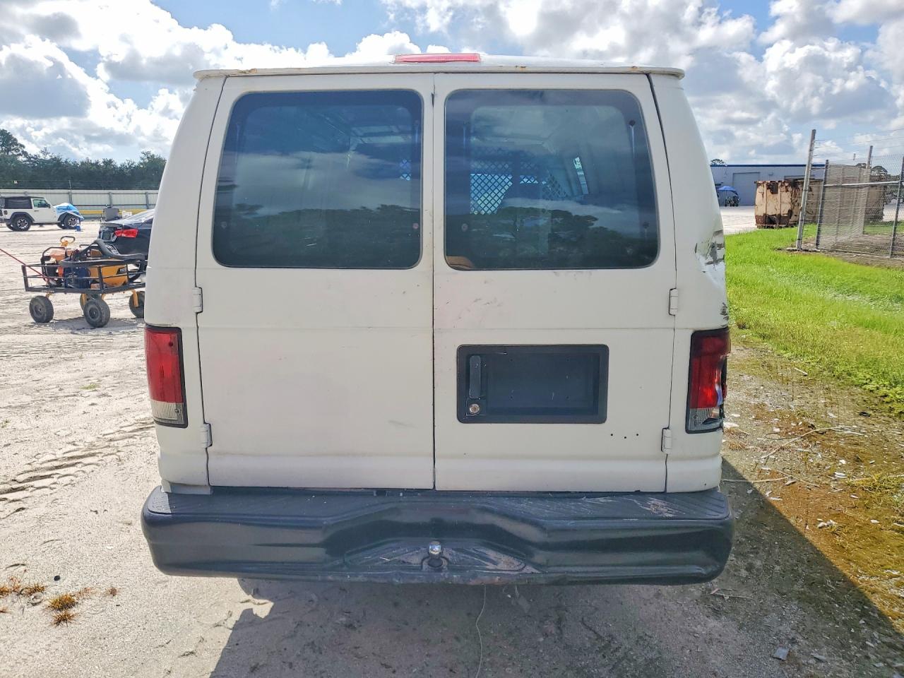 1FTRE14251HB75955 · 2001 FORD E150 · 6/14