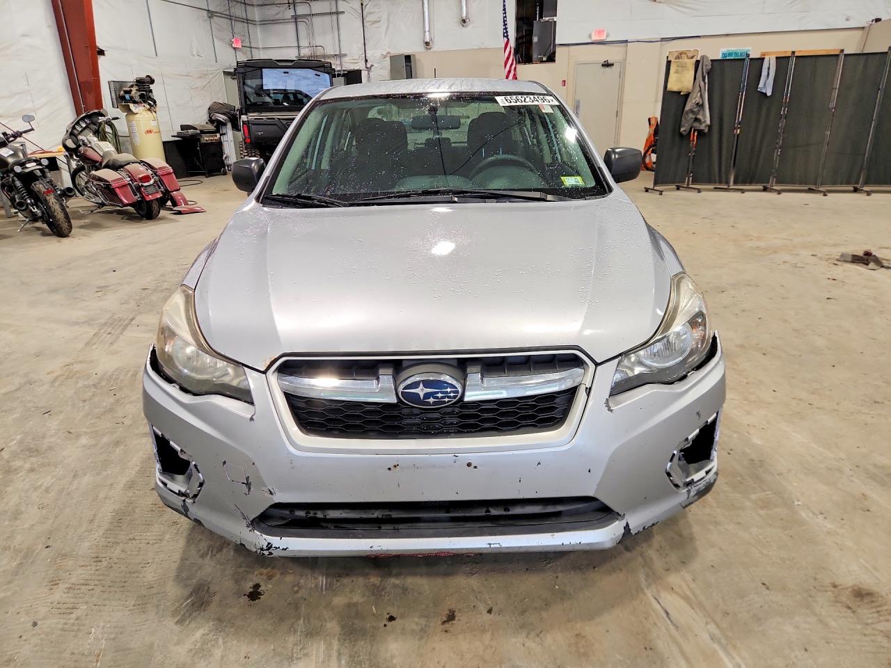 JF1GJAA64EG013309 · 2014 SUBARU IMPREZA · 5/12