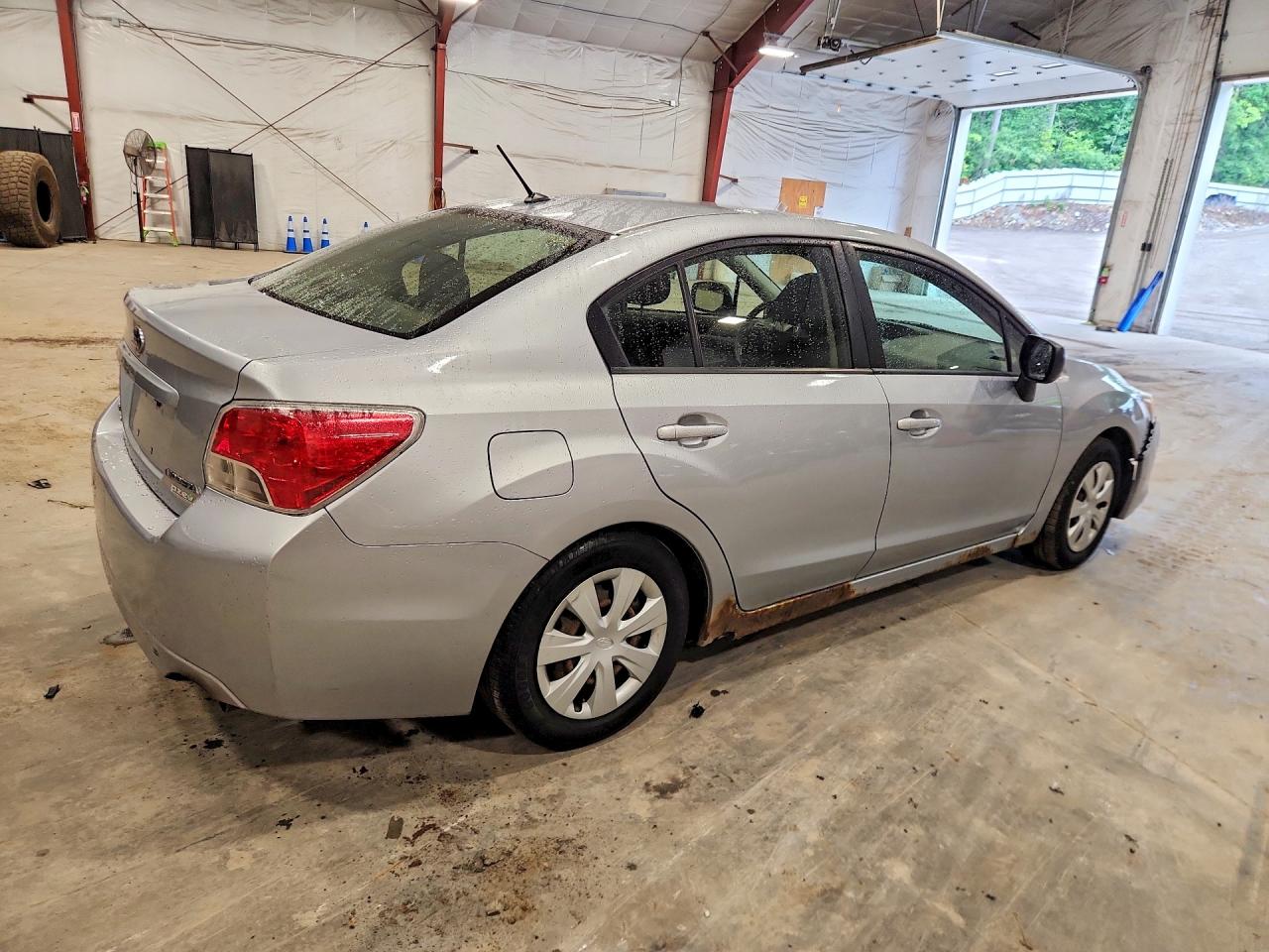 JF1GJAA64EG013309 · 2014 SUBARU IMPREZA · 3/12