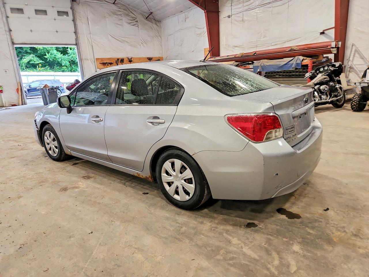 JF1GJAA64EG013309 · 2014 SUBARU IMPREZA · 2/12
