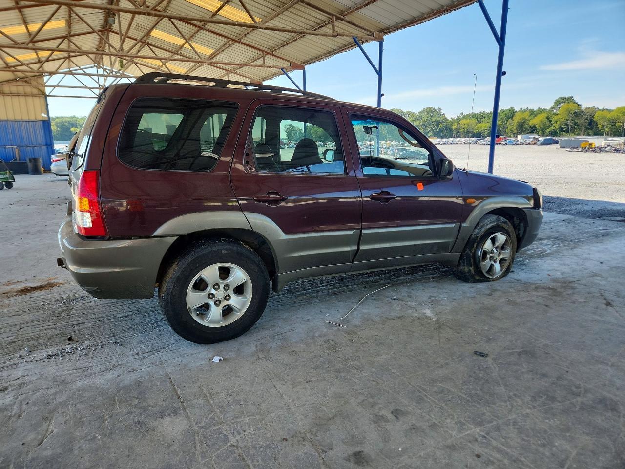 4F2CU08181KM70250 · 2001 MAZDA TRIBUTE · 3/12