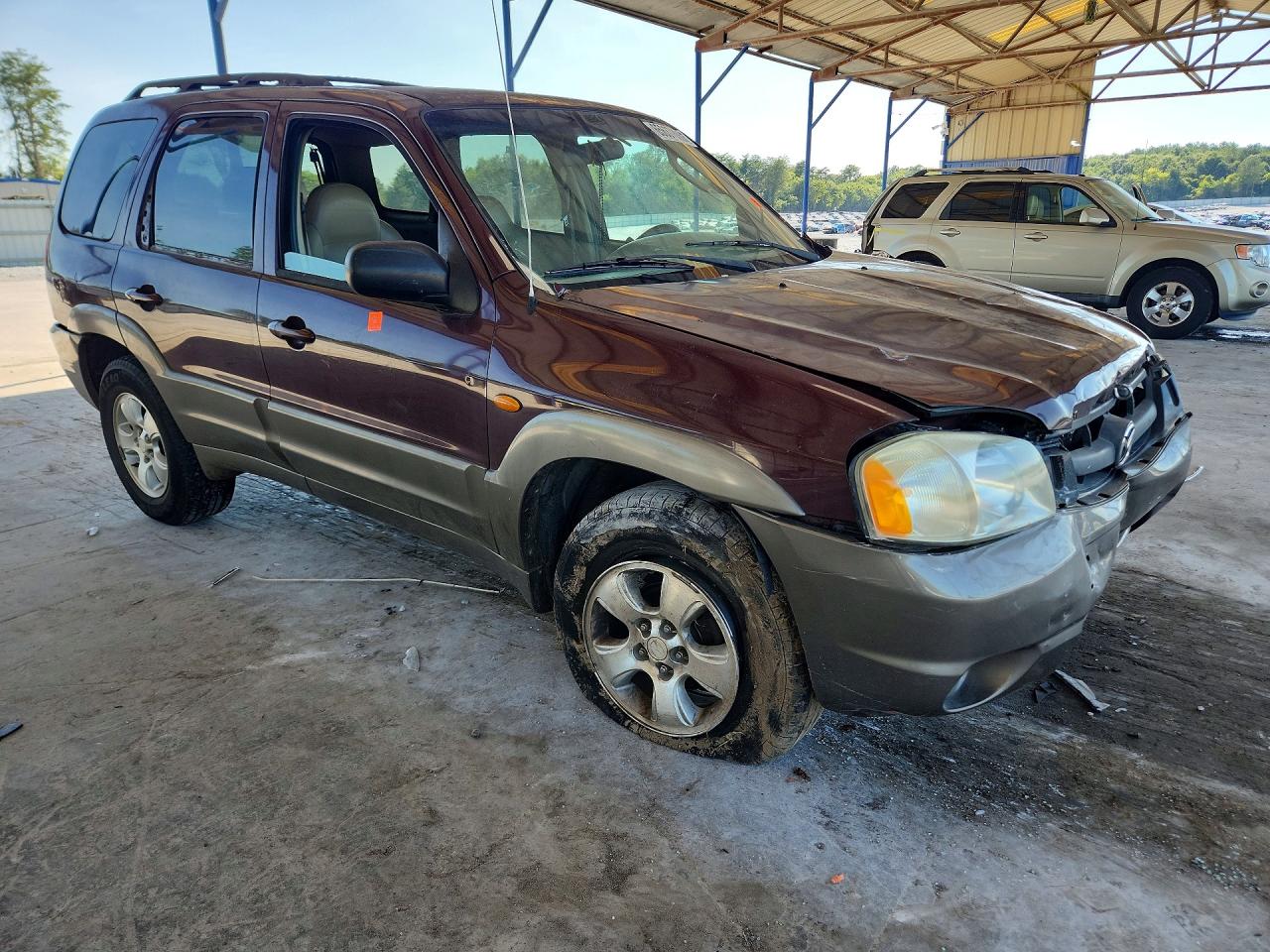 4F2CU08181KM70250 · 2001 MAZDA TRIBUTE · 4/12