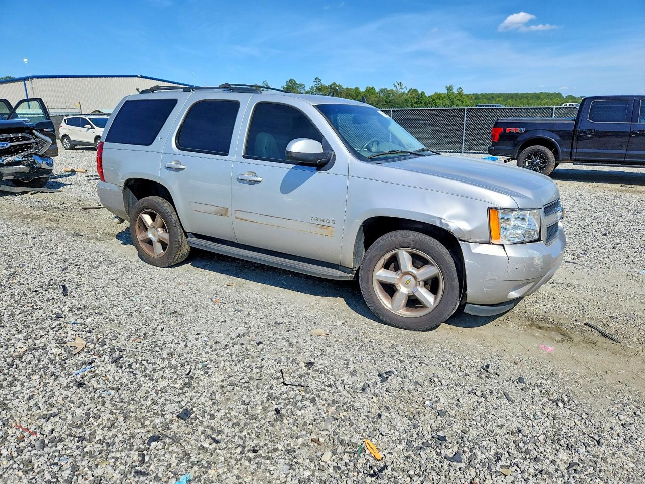 1GNSCBE05BR293498 · 2011 CHEVROLET TAHOE · 4/13
