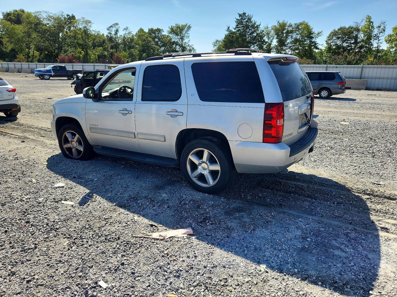 1GNSCBE05BR293498 · 2011 CHEVROLET TAHOE · 2/13