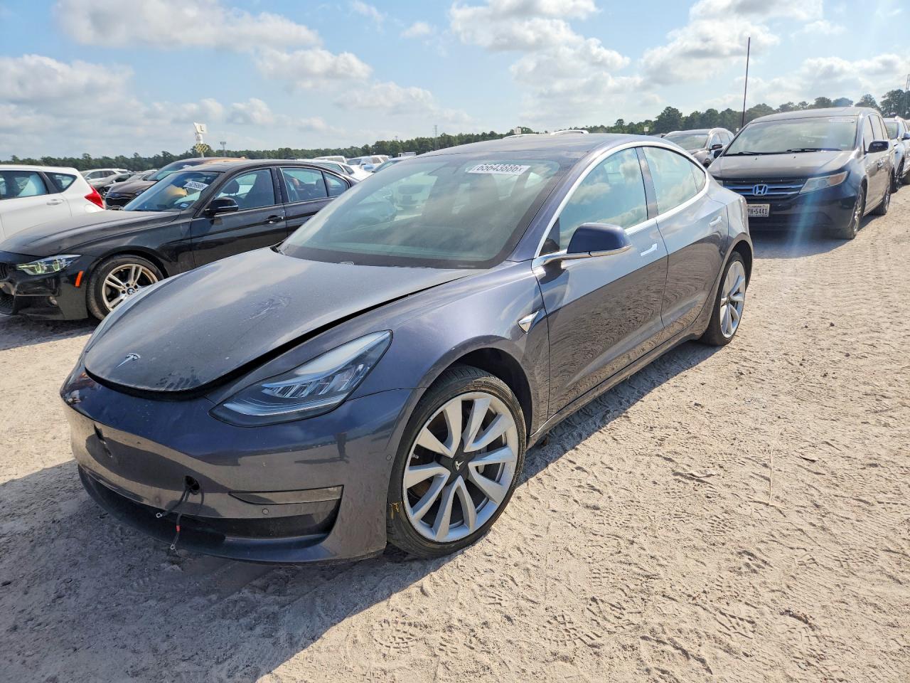 5YJ3E1EA1JF163460 · 2018 TESLA MODEL 3