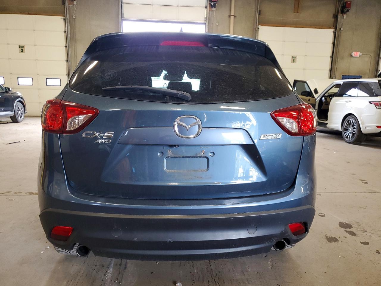 JM3KE4DY5F0443858 · 2015 MAZDA CX-5 · 6/13