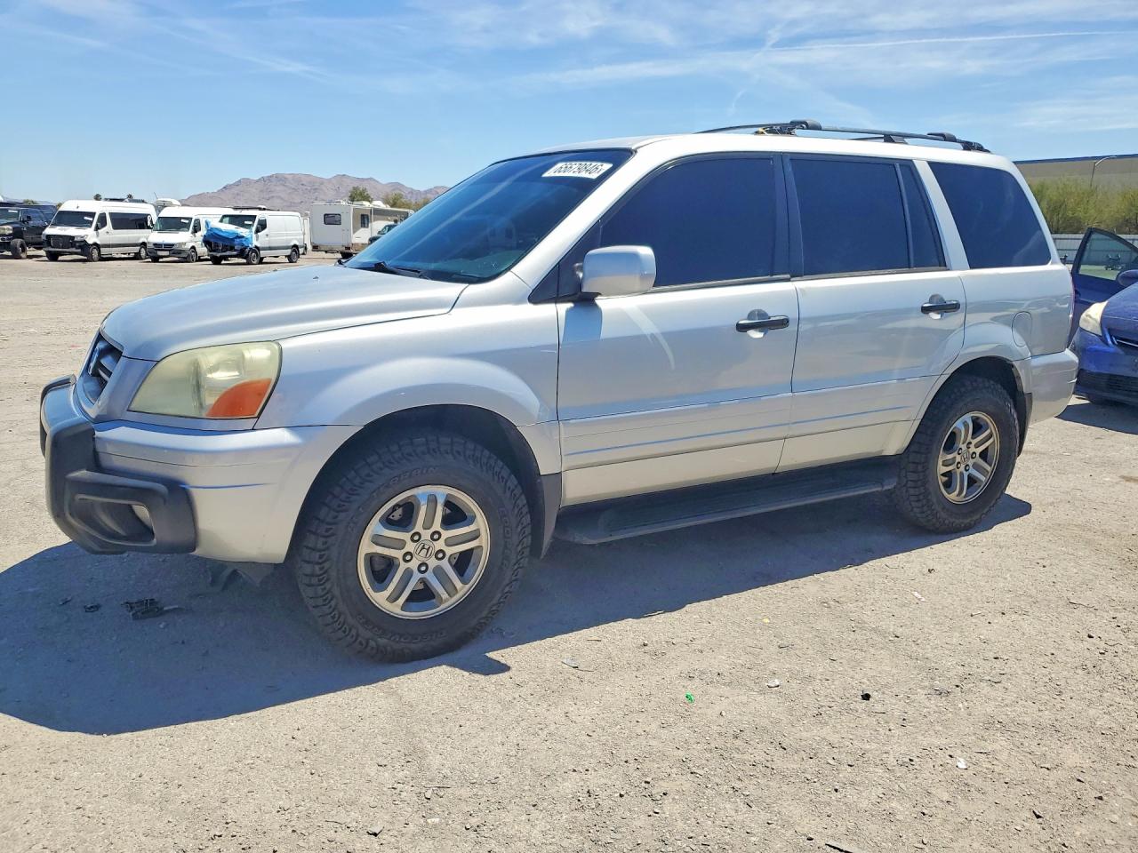 2HKYF187X4H573358 · 2004 HONDA PILOT
