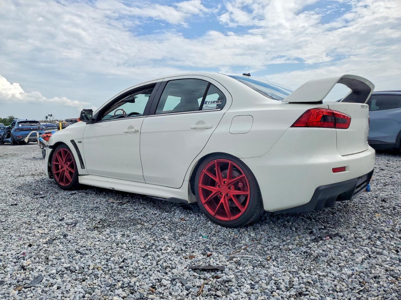 JA32W5FV2DU011733 · 2013 MITSUBISHI LANCER · 2/12
