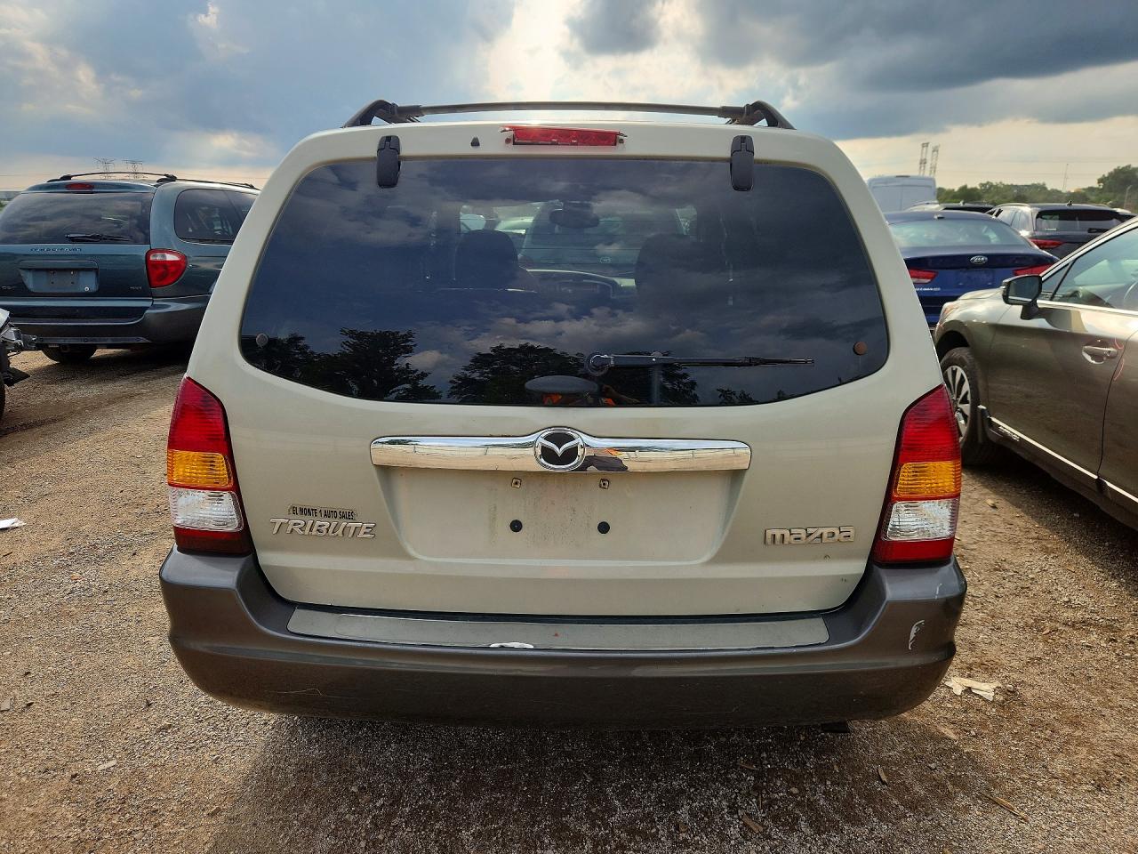 4F2YZ94124KM21972 · 2004 MAZDA TRIBUTE · 6/12