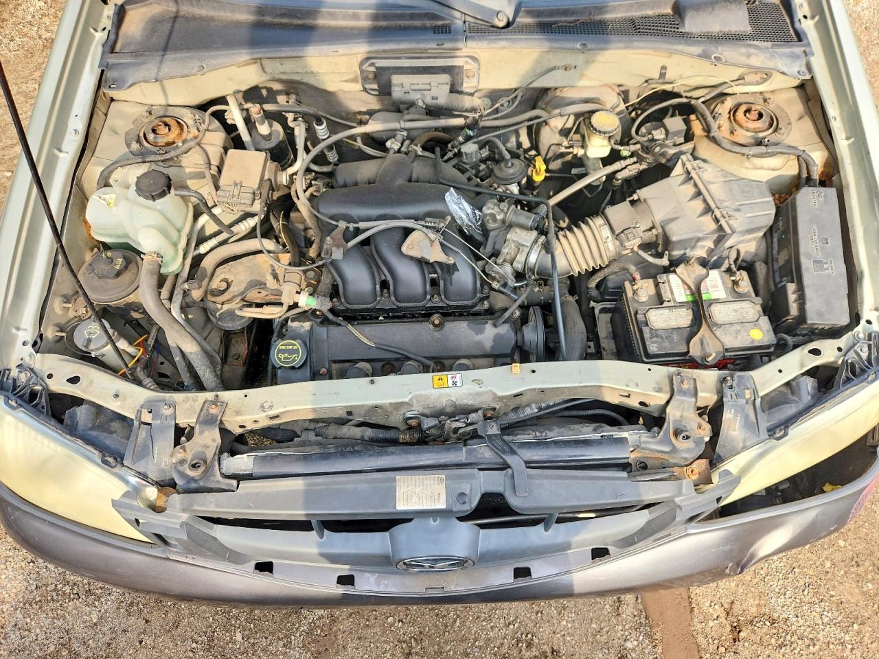 4F2YZ94124KM21972 · 2004 MAZDA TRIBUTE · 11/12