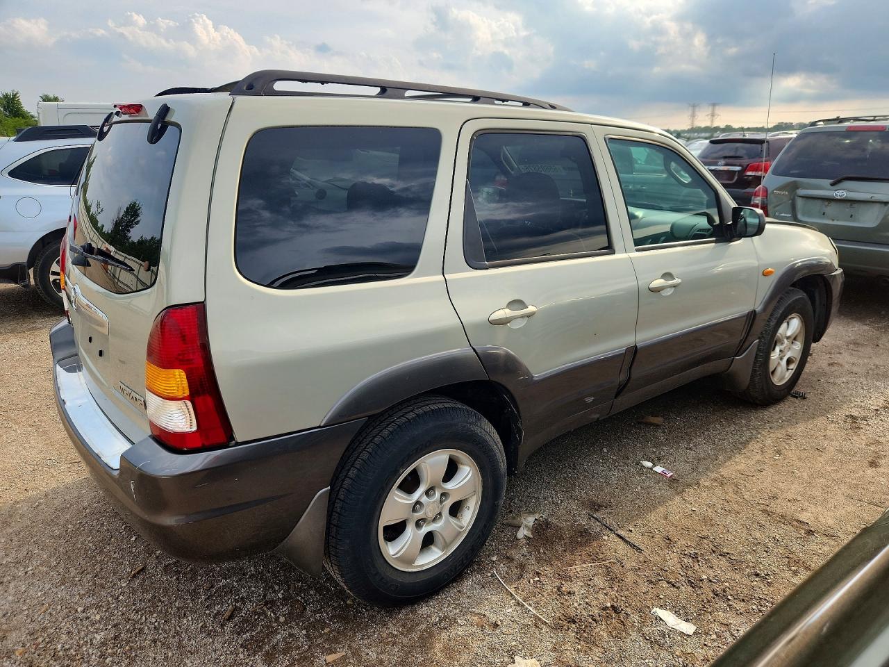4F2YZ94124KM21972 · 2004 MAZDA TRIBUTE · 3/12