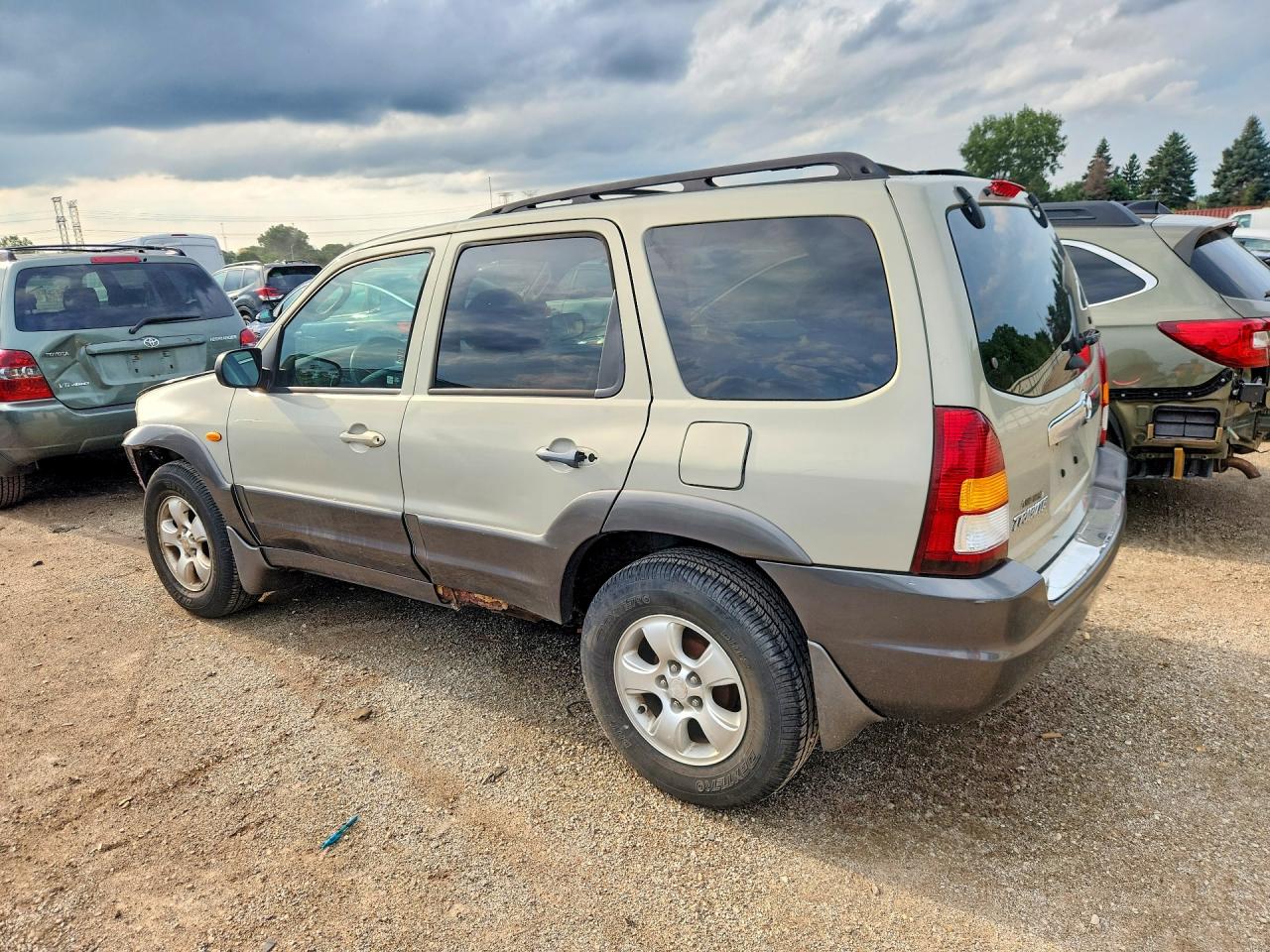 4F2YZ94124KM21972 · 2004 MAZDA TRIBUTE · 2/12