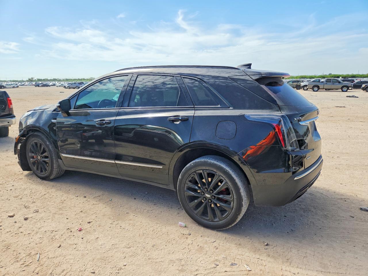 1GYKNGRS8PZ203581 · 2023 CADILLAC XT5 · 2/12