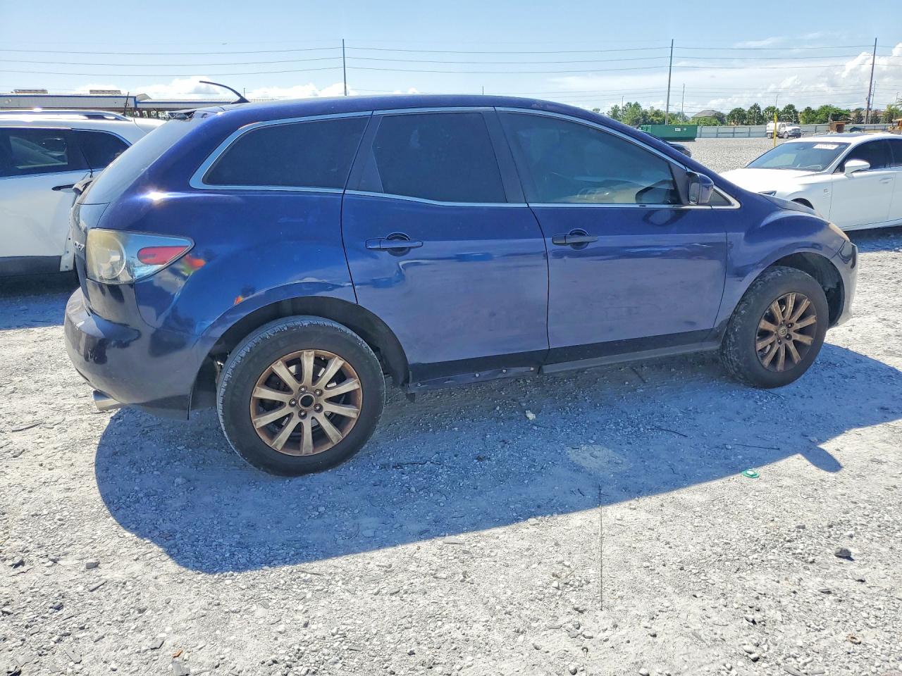 JM3ER2B52B0407988 · 2011 MAZDA CX-7 · 3/13