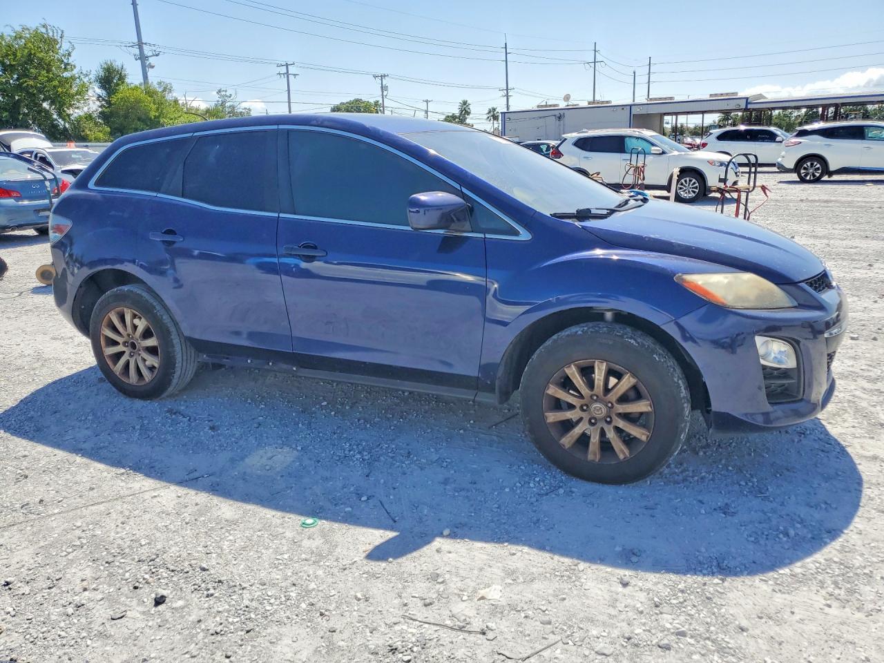 JM3ER2B52B0407988 · 2011 MAZDA CX-7 · 4/13