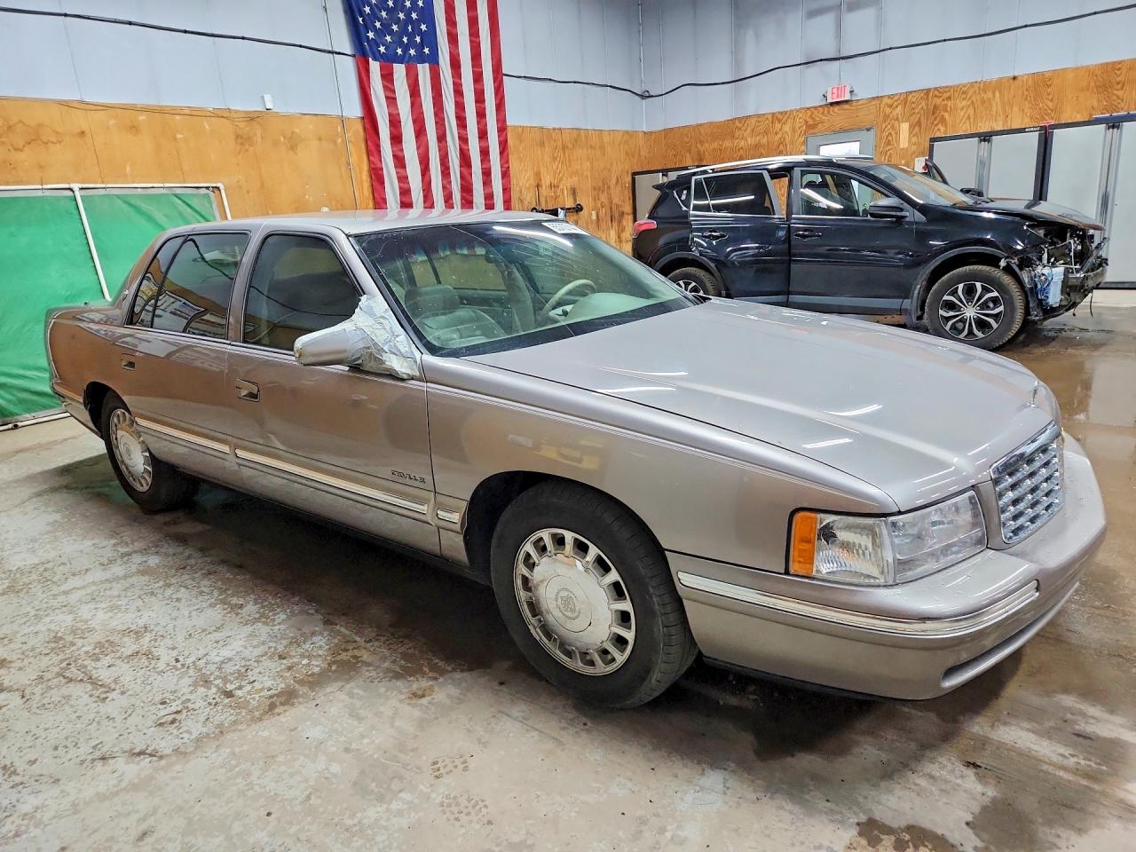 1G6KD54YXWU770396 · 1998 CADILLAC DEVILLE · 4/12