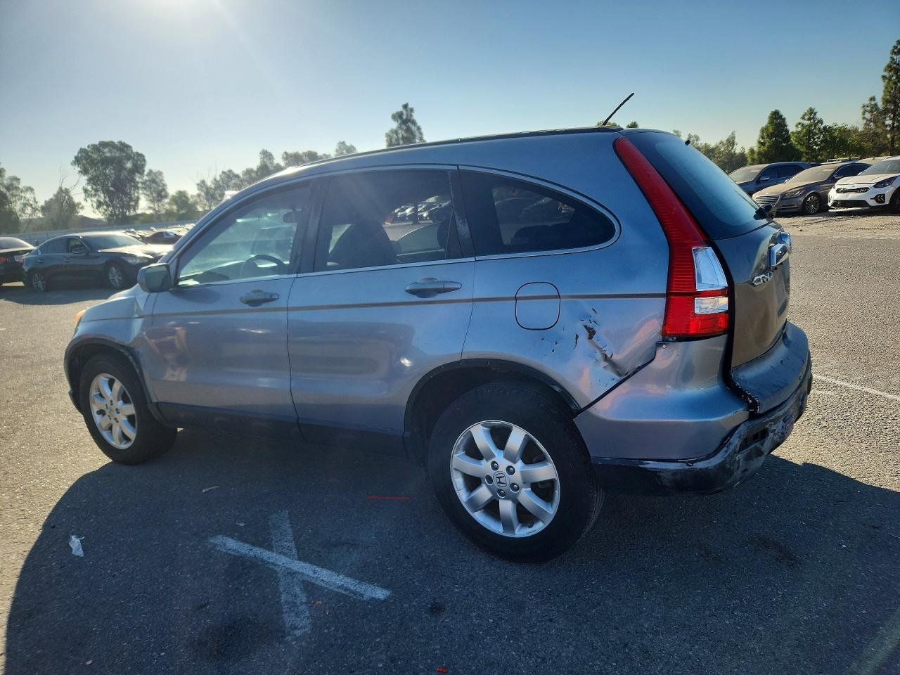 JHLRE38727C002338 · 2007 HONDA CR-V · 2/12