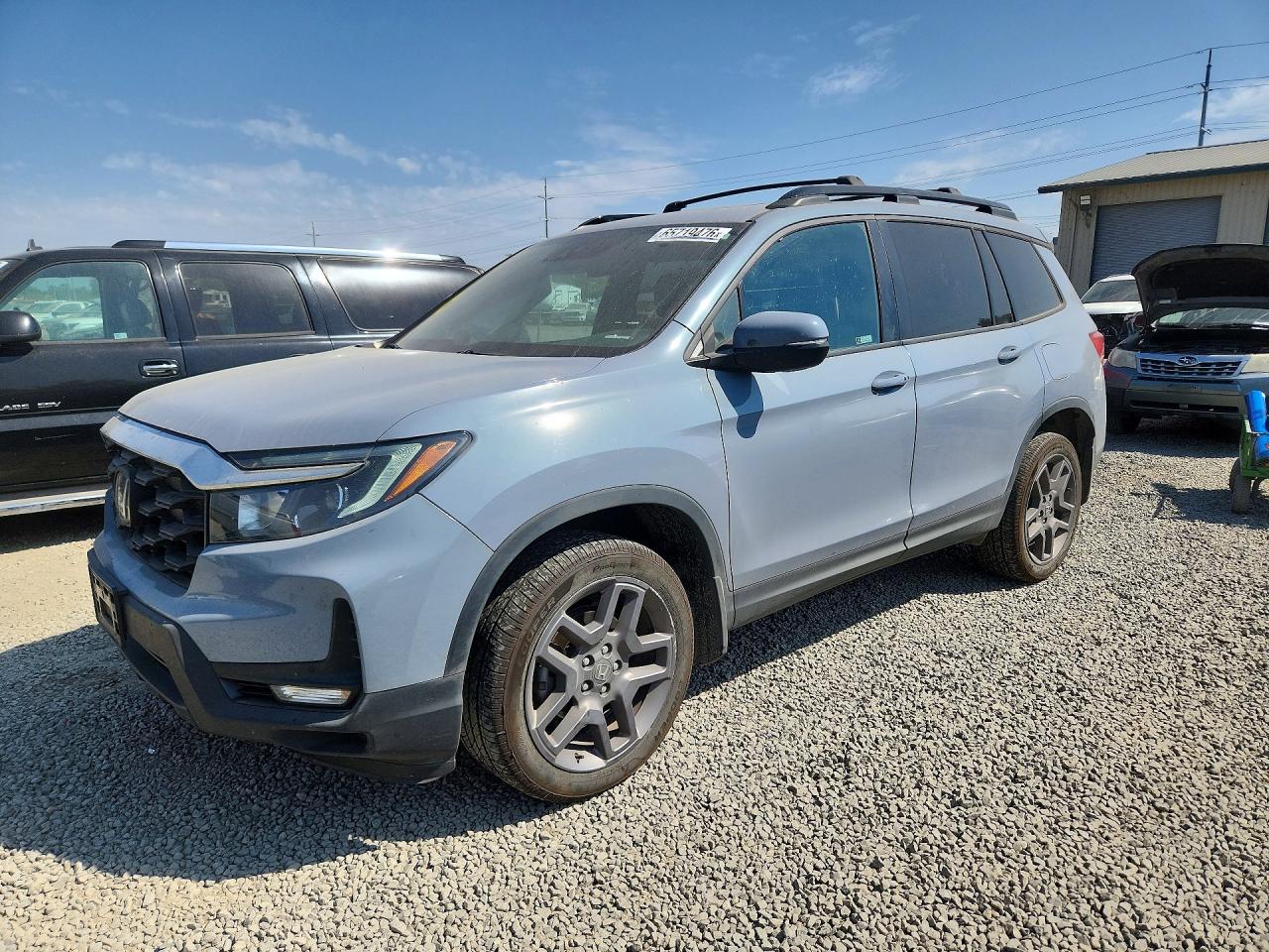 5FNYF8H58PB038569 · 2023 HONDA PASSPORT