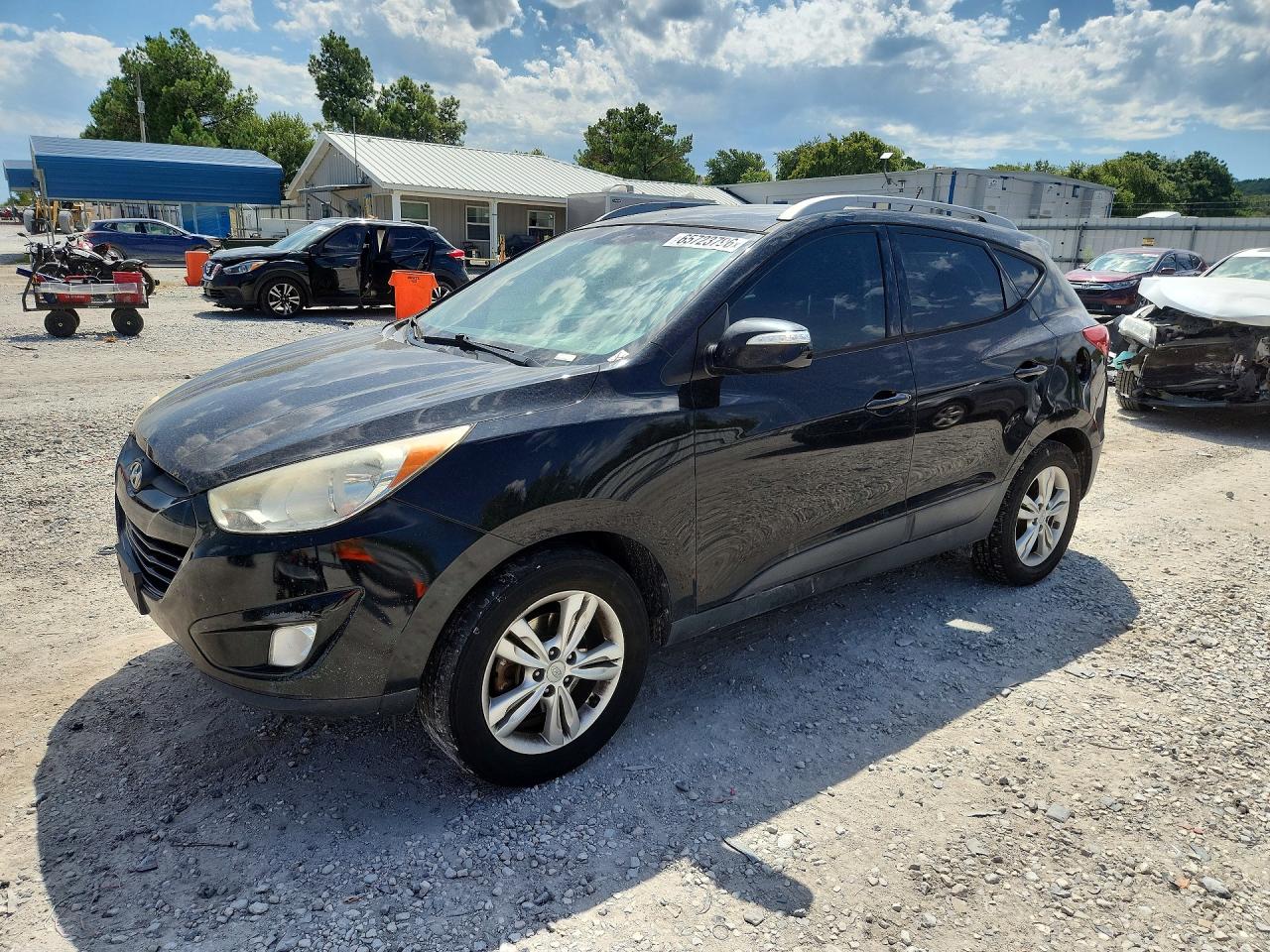 KM8JU3AC5DU640816 · 2013 HYUNDAI TUCSON