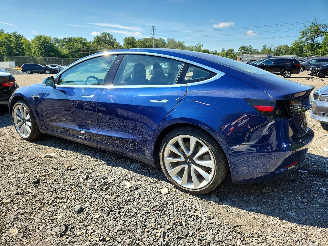 5YJ3E1EA5JF033391 · 2018 TESLA MODEL 3 · 2/12