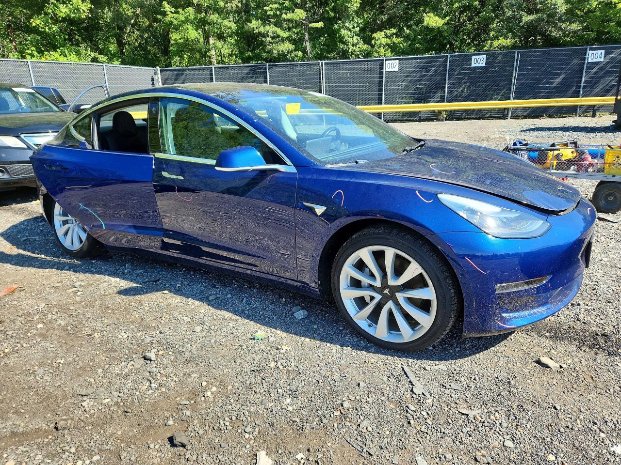 5YJ3E1EA5JF033391 · 2018 TESLA MODEL 3 · 4/12