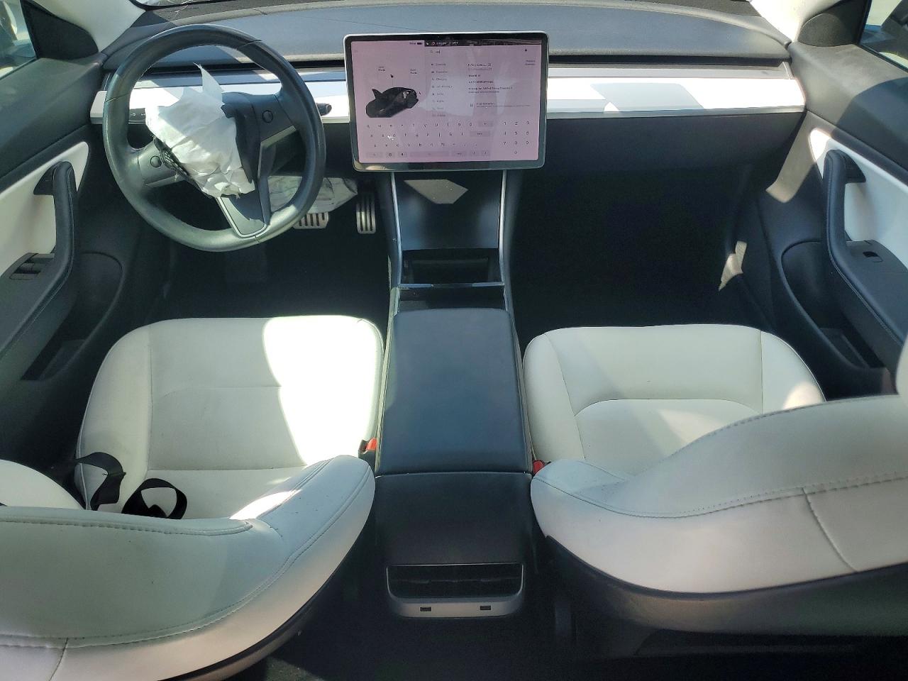 5YJ3E1EB1JF171082 · 2018 TESLA MODEL 3 · 8/12