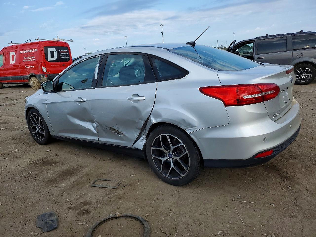 1FADP3H23JL242484 · 2018 FORD FOCUS · 2/12