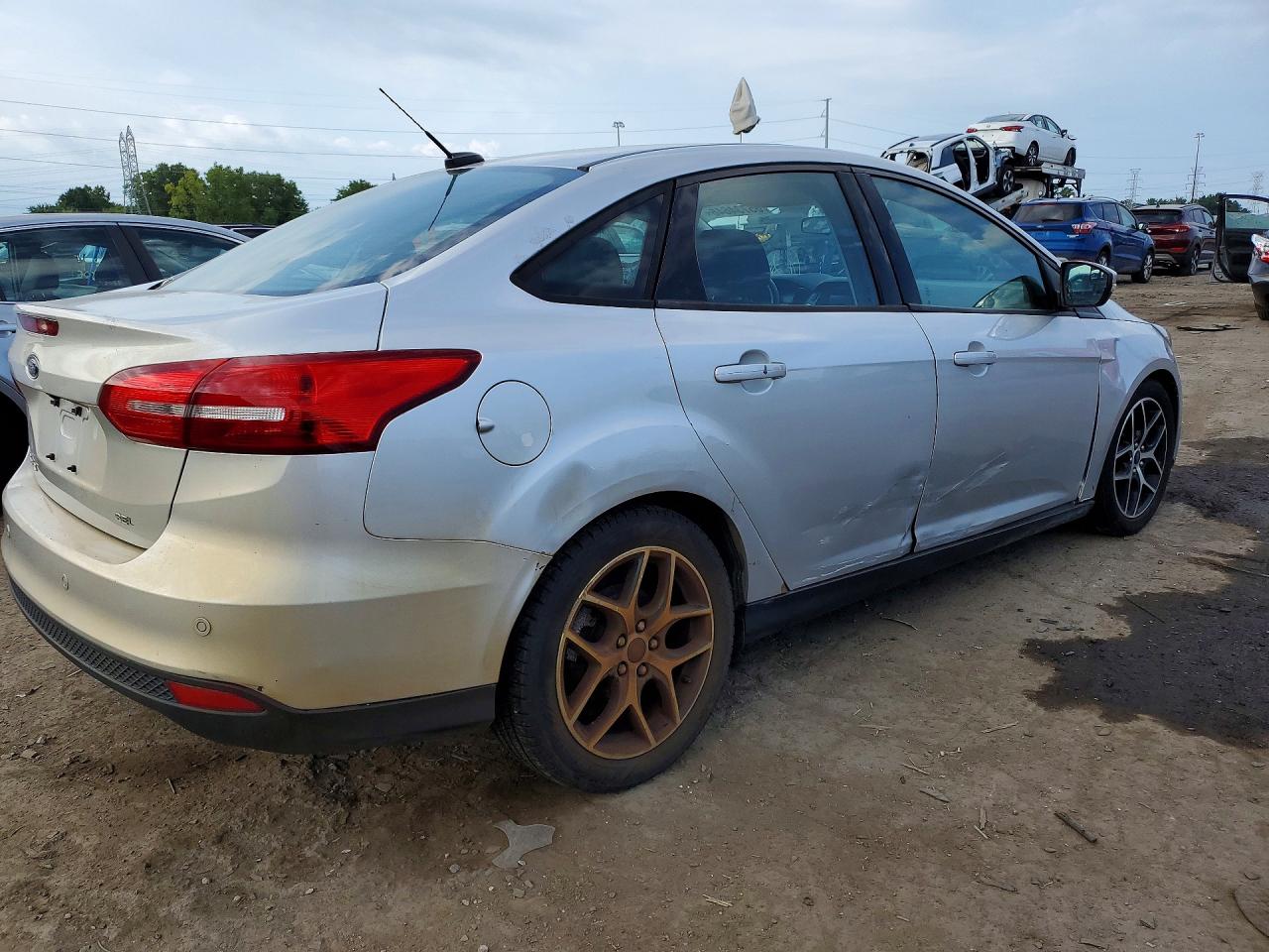 1FADP3H23JL242484 · 2018 FORD FOCUS · 3/12