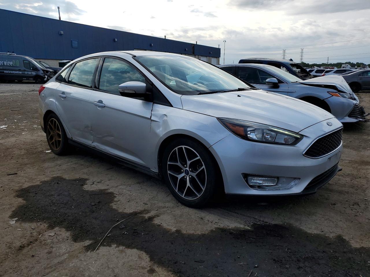1FADP3H23JL242484 · 2018 FORD FOCUS · 4/12