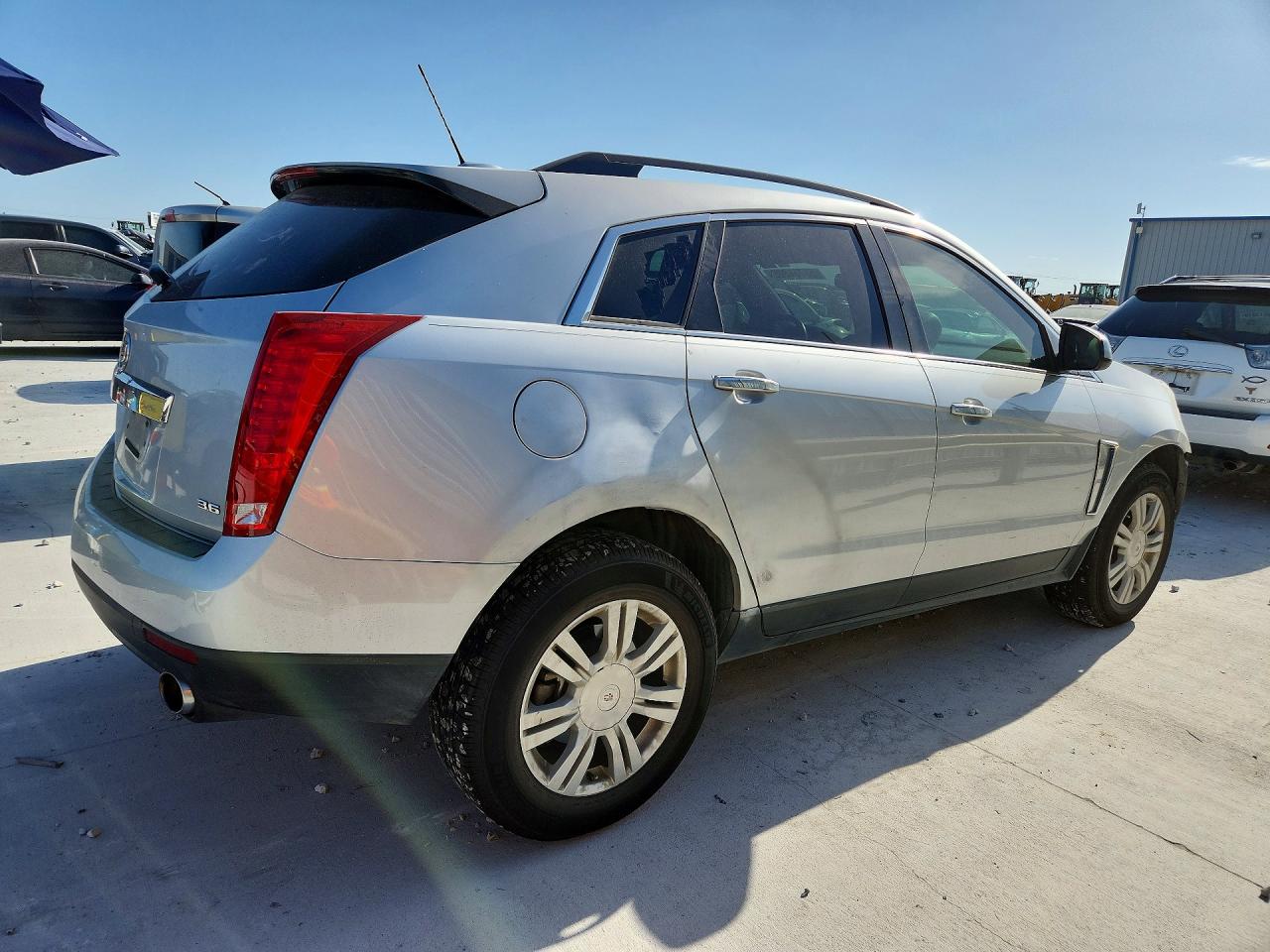 3GYFNAE30FS595335 · 2015 CADILLAC SRX · 3/14
