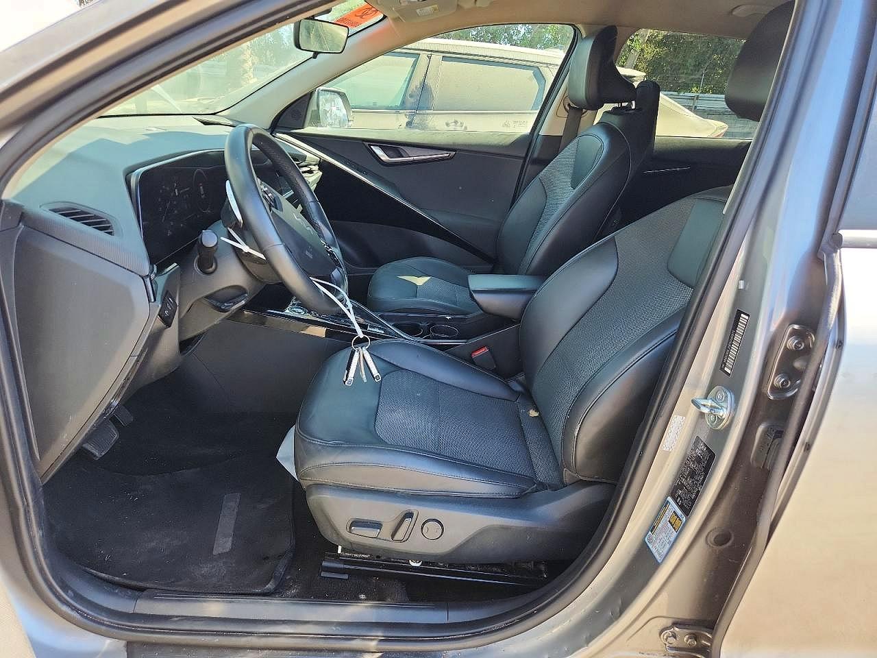 KNDCR3L15P5036871 · 2023 KIA NIRO · 7/12