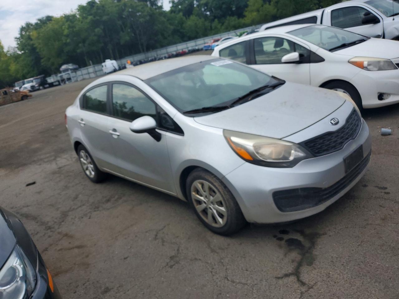 KNADM4A35E6397812 · 2014 KIA RIO · 4/12
